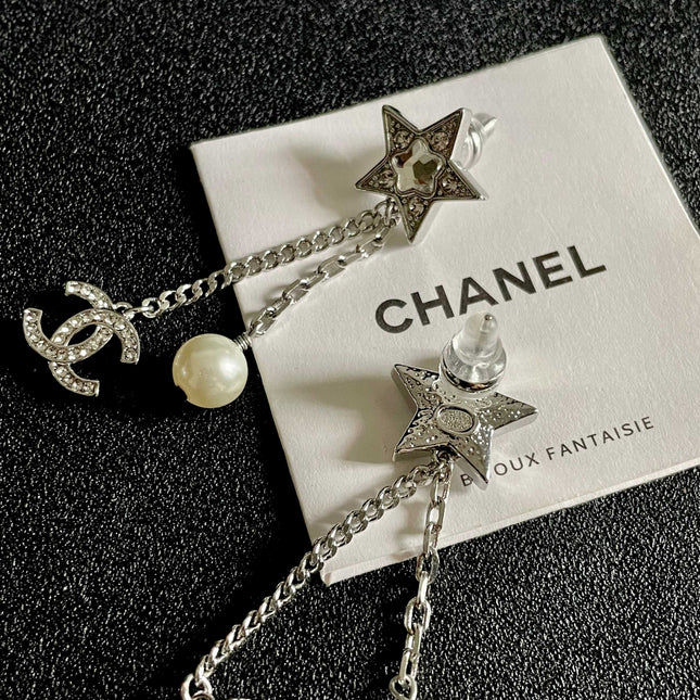 DOUBLE C STUD EARRINGS WITH STAR STONE DOUBLE CHAINS ONE WITH LOGO AND ONE WITH PEARL