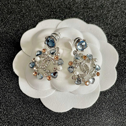 DOUBLE C STUD EARRINGS IN SILVER METAL WHITE PEARL GOLD AND BLUE STONES