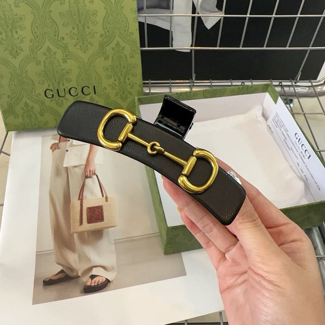 GOLD HORSEBIT CLAW CLIP IN BLACK LAMBSKIN AND RESIN 188103