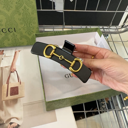 GOLD HORSEBIT CLAW CLIP IN BLACK LAMBSKIN AND RESIN 188103