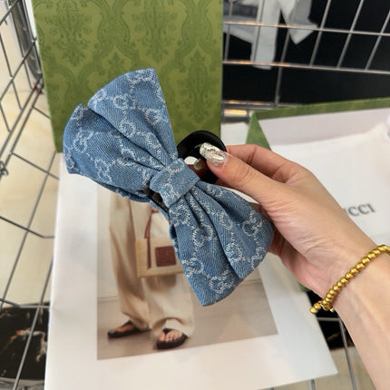 BOW CLAW CLIP IN LIGHT BLUE DENIM 425503