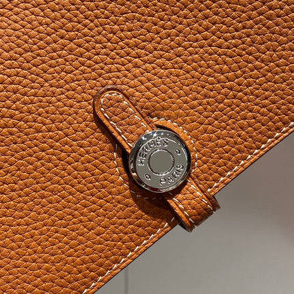 TOGO PASSPORT HOLDER 20 IN GINGER ORANGE CALFSKIN