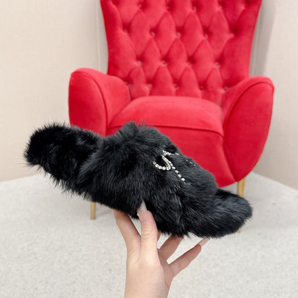 BALENCIAGA 25S SOFT FUR SLIPPERS IN BLACK FUR WITH RHINESTONE BOW