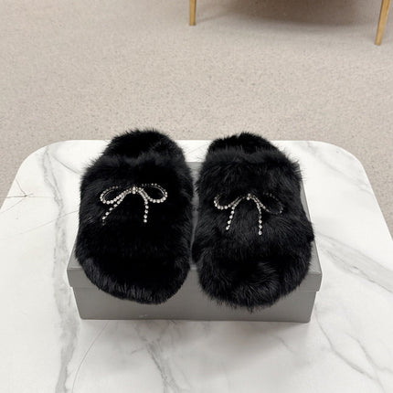 BALENCIAGA 25S SOFT FUR SLIPPERS IN BLACK FUR WITH RHINESTONE BOW