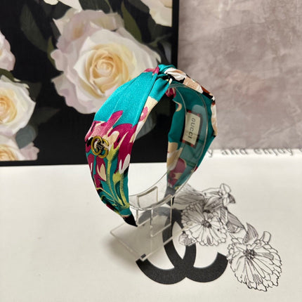 HAIRBAND IN TURQUOISE GREEN FLORAL SILK 252676