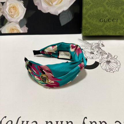 HAIRBAND IN TURQUOISE GREEN FLORAL SILK 252676