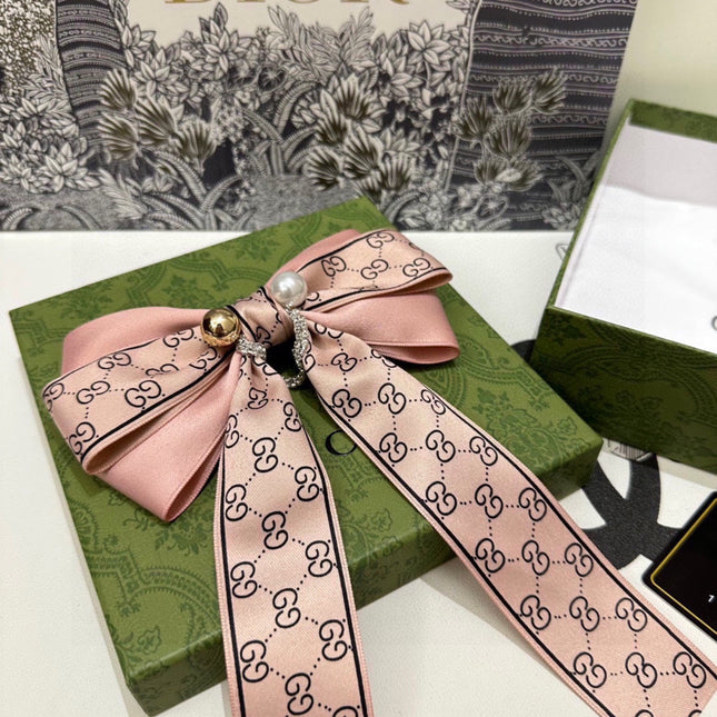 RIBBON BOW HAIR CLIP IN BABY PINK RE-NYLON ATTACHED PEARL 358259