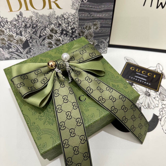 RIBBON BOW HAIR CLIP IN OLIVE GREEN RE-NYLON ATTACHED PEARL 358261