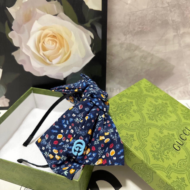 HAIRBAND IN NAVY BLUE FLORAL FABRIC 385854