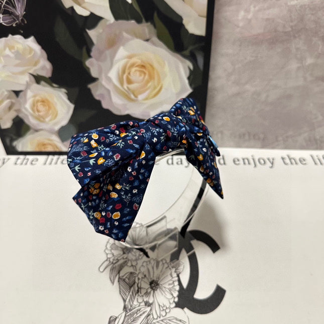 HAIRBAND IN NAVY BLUE FLORAL FABRIC 385854