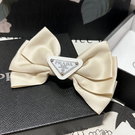 BREEZE BEIGE RE-NYLON BOW HAIR CLIP 391660