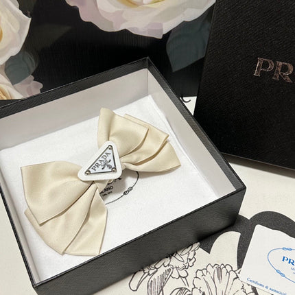 BREEZE BEIGE RE-NYLON BOW HAIR CLIP 391660