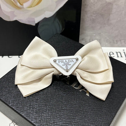 BREEZE BEIGE RE-NYLON BOW HAIR CLIP 391660