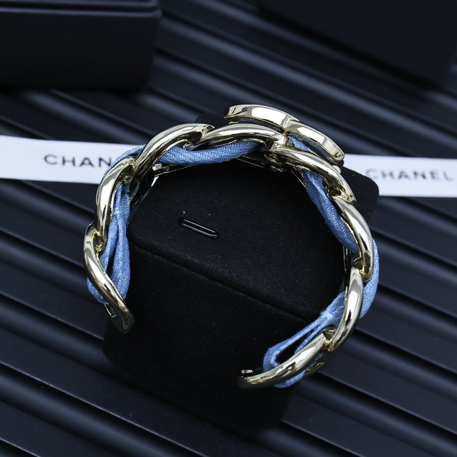 CC 25P IN DENIM-THREADED WIDE CHAIN GOLD METAL BRACELET