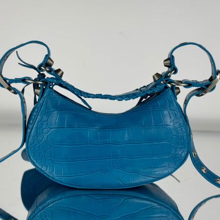 LE CAGOLE SMALL SHOULDER BAG 26 WITH RHINESTONES IN DODPER BLUE CROCODILE EMBOSSED CALFSKIN