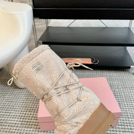 SNOW LONG BOOTS IN COSMIC LATTE SHEARLING