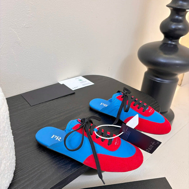 SNEAKER MULES IN BLUE NYLON AND RED SUEDE