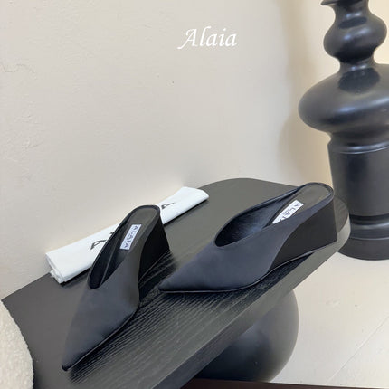 ALAIA HIGH MULES 25S IN BLACK SATIN