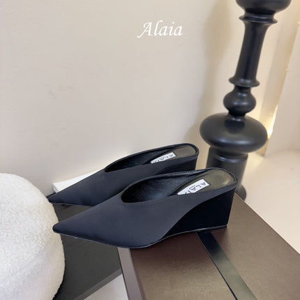 ALAIA HIGH MULES 25S IN BLACK SATIN