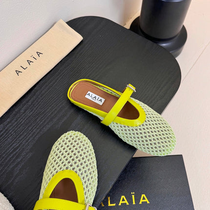 ALAIA FLAT MULES 25S IN MINT GREEN WOVEN MESH