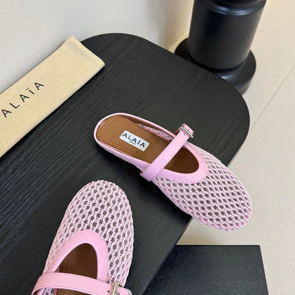 ALAIA FLAT MULES 25S IN BLUSH PINK WOVEN MESH