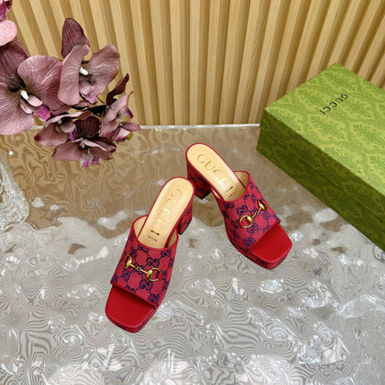 HORSEBIT SLIDE SANDAL IN RED MONOGRAM CANVAS AND SHEEPSKIN LINING