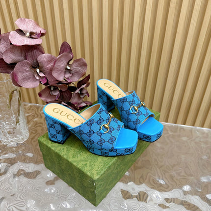 HORSEBIT SLIDE SANDAL IN AZURE BLUE MONOGRAM CANVAS AND SHEEPSKIN LINING