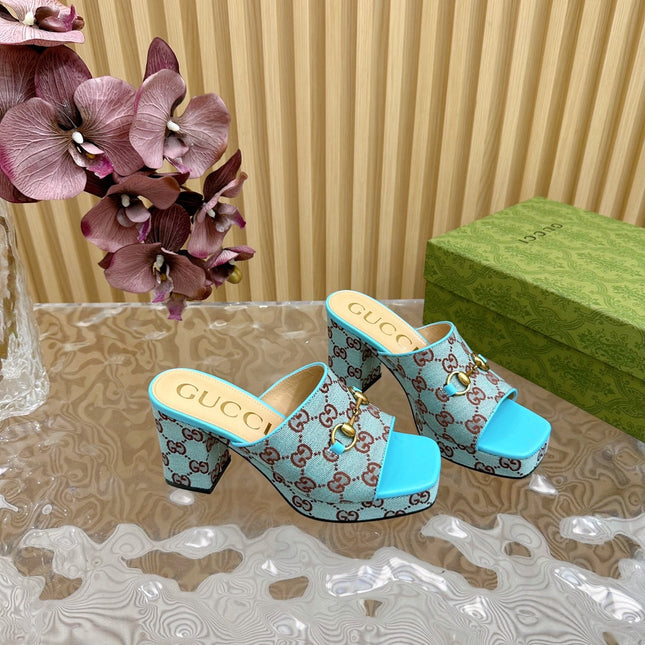 HORSEBIT SLIDE SANDAL IN SKY BLUE MONOGRAM CANVAS AND SHEEPSKIN LINING