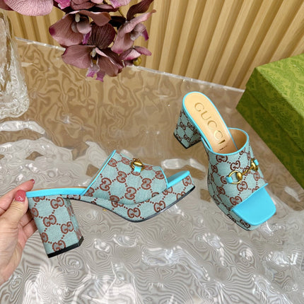 HORSEBIT SLIDE SANDAL IN SKY BLUE MONOGRAM CANVAS AND SHEEPSKIN LINING