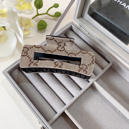 CLAW CLIP IN BEIGE AND EBONY MONOGRAM CANVAS AND RESIN 310623