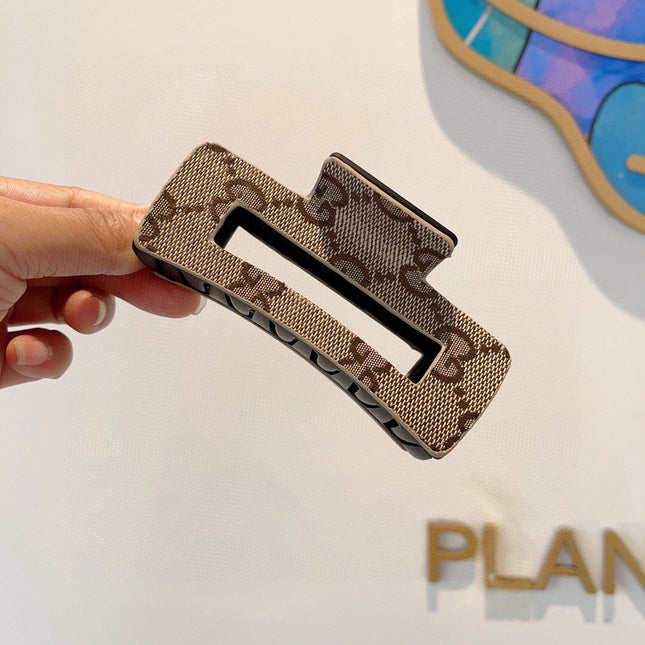 CLAW CLIP IN BEIGE AND EBONY MONOGRAM CANVAS AND RESIN 310623