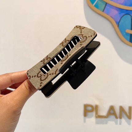 CLAW CLIP IN BEIGE AND EBONY MONOGRAM CANVAS AND RESIN 310623