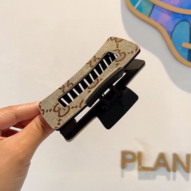 CLAW CLIP IN BEIGE AND EBONY MONOGRAM CANVAS AND RESIN 310623