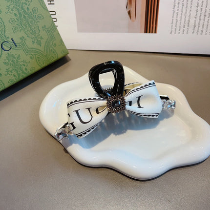 CLAW CLIP DIAMOND-EMBELLISHED IN WHITE RESIN AND RE-NYLON 343271