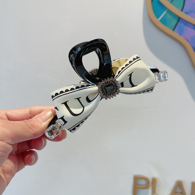 CLAW CLIP DIAMOND-EMBELLISHED IN WHITE RESIN AND RE-NYLON 343271