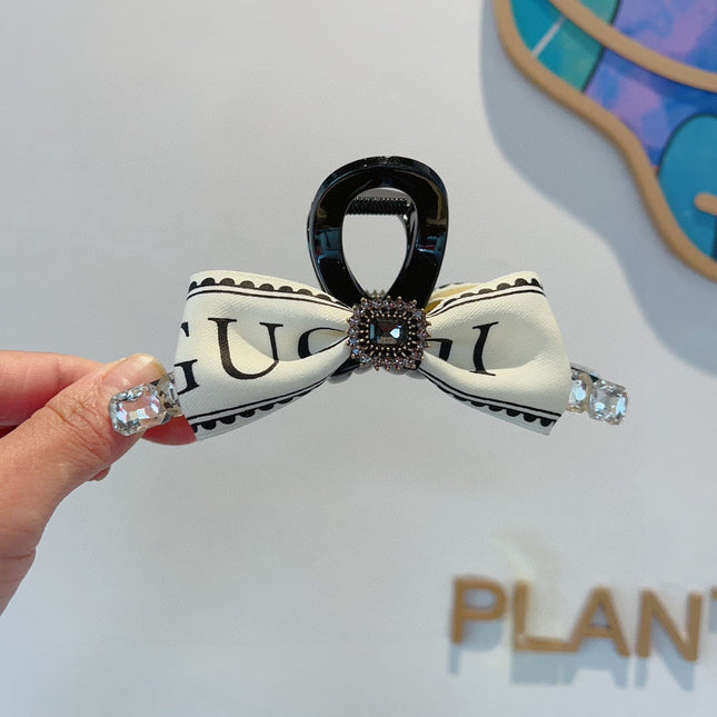 CLAW CLIP DIAMOND-EMBELLISHED IN WHITE RESIN AND RE-NYLON 343271