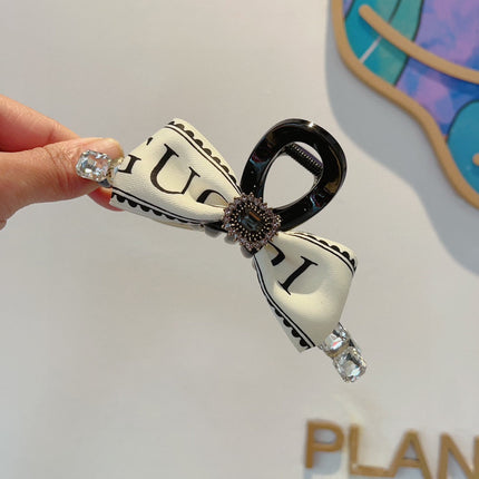 CLAW CLIP DIAMOND-EMBELLISHED IN WHITE RESIN AND RE-NYLON 343271