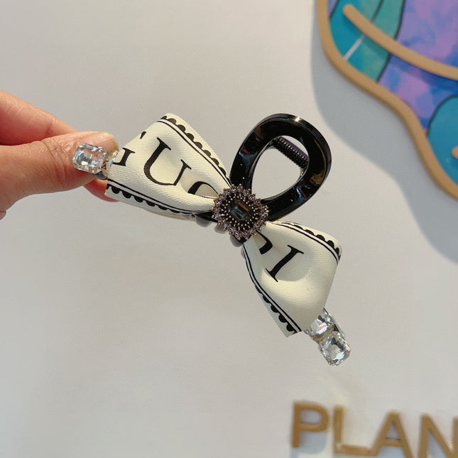 CLAW CLIP DIAMOND-EMBELLISHED IN WHITE RESIN AND RE-NYLON 343271