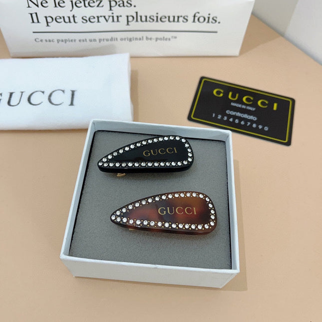 HAIR CLIP IN TORTOISESHELL RESIN AND BRASS ATTACHED CRYSTALS 425468