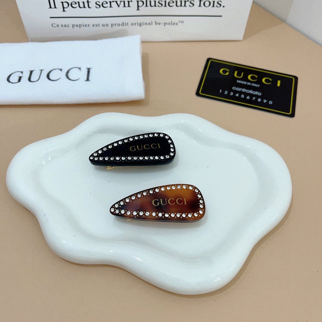 HAIR CLIP IN TORTOISESHELL RESIN AND BRASS ATTACHED CRYSTALS 425468