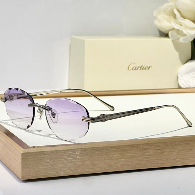 C DE RIMLESS ROUND FRAME SUNGLASSES CT0611S IN METAL