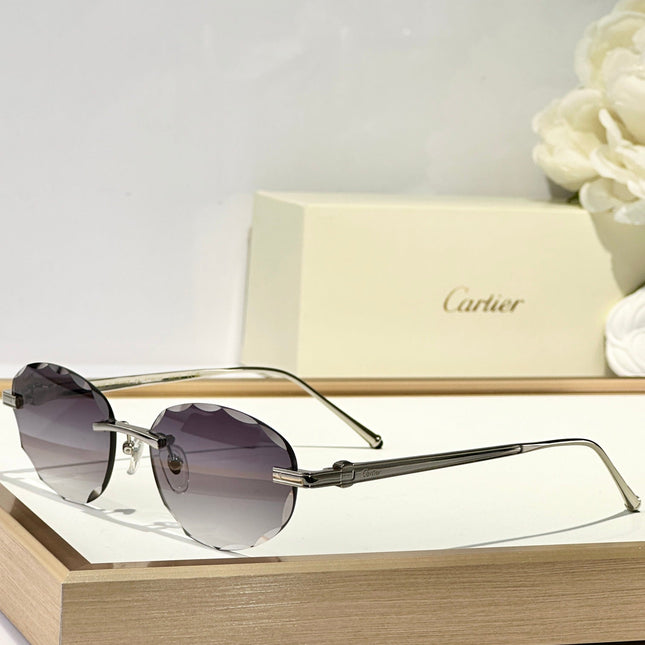 C DE RIMLESS ROUND FRAME SUNGLASSES CT0611S IN METAL