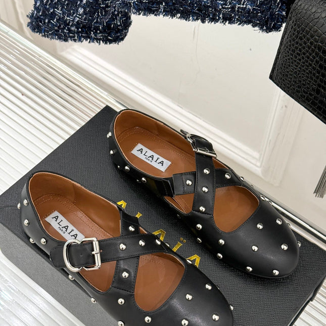 CROSSED STRAP BALLET FLATS IN BLACK CALFSKIN