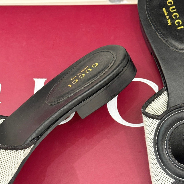 SLIDE SANDALS IN BLACK AND WHITE CALFSKIN