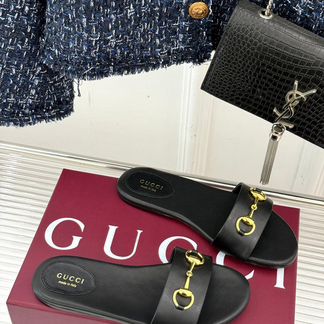 SLIDE SANDALS IN BLACK CALFSKIN WITH GOLD HARDWARE