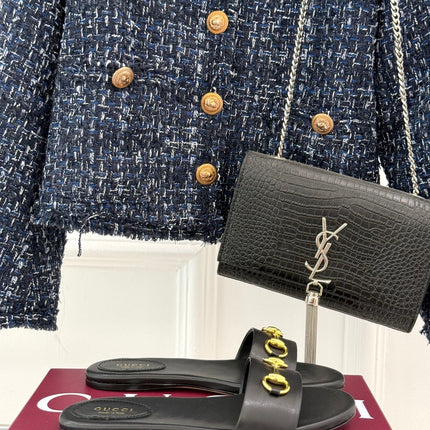 SLIDE SANDALS IN BLACK CALFSKIN WITH GOLD HARDWARE