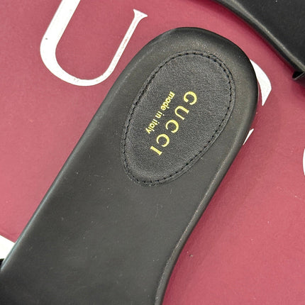 SLIDE SANDALS IN BLACK CALFSKIN WITH GOLD HARDWARE