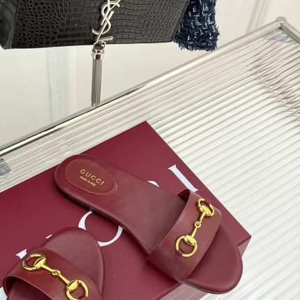 SLIDE SANDALS IN RED CALFSKIN WITH GOLD HARDWARE