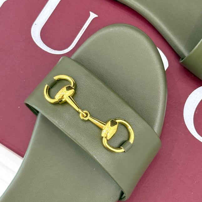 SLIDE SANDALS IN MOSS GREEN CALFSKIN WITH GOLD HARDWARE