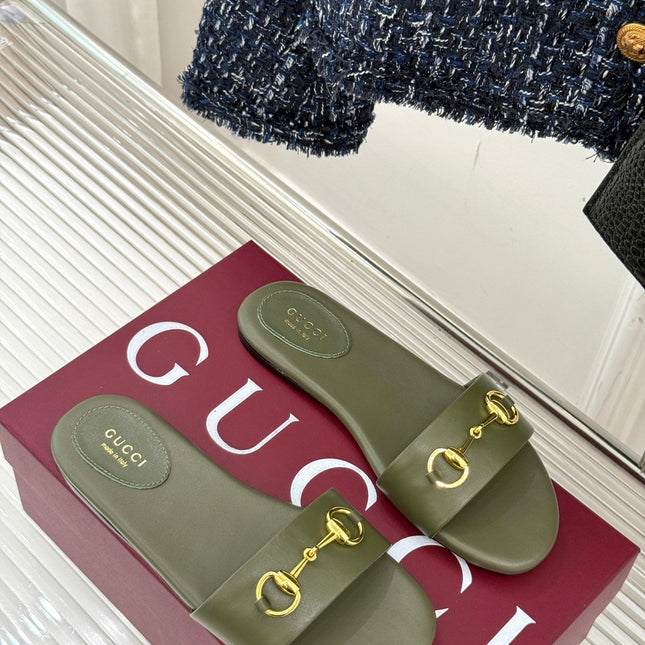 SLIDE SANDALS IN MOSS GREEN CALFSKIN WITH GOLD HARDWARE